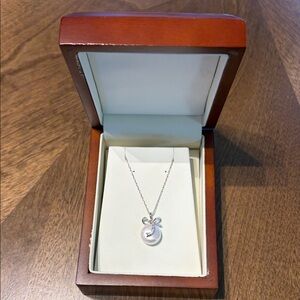 Silver Pearl Pendant Necklace with Bow Accent - White